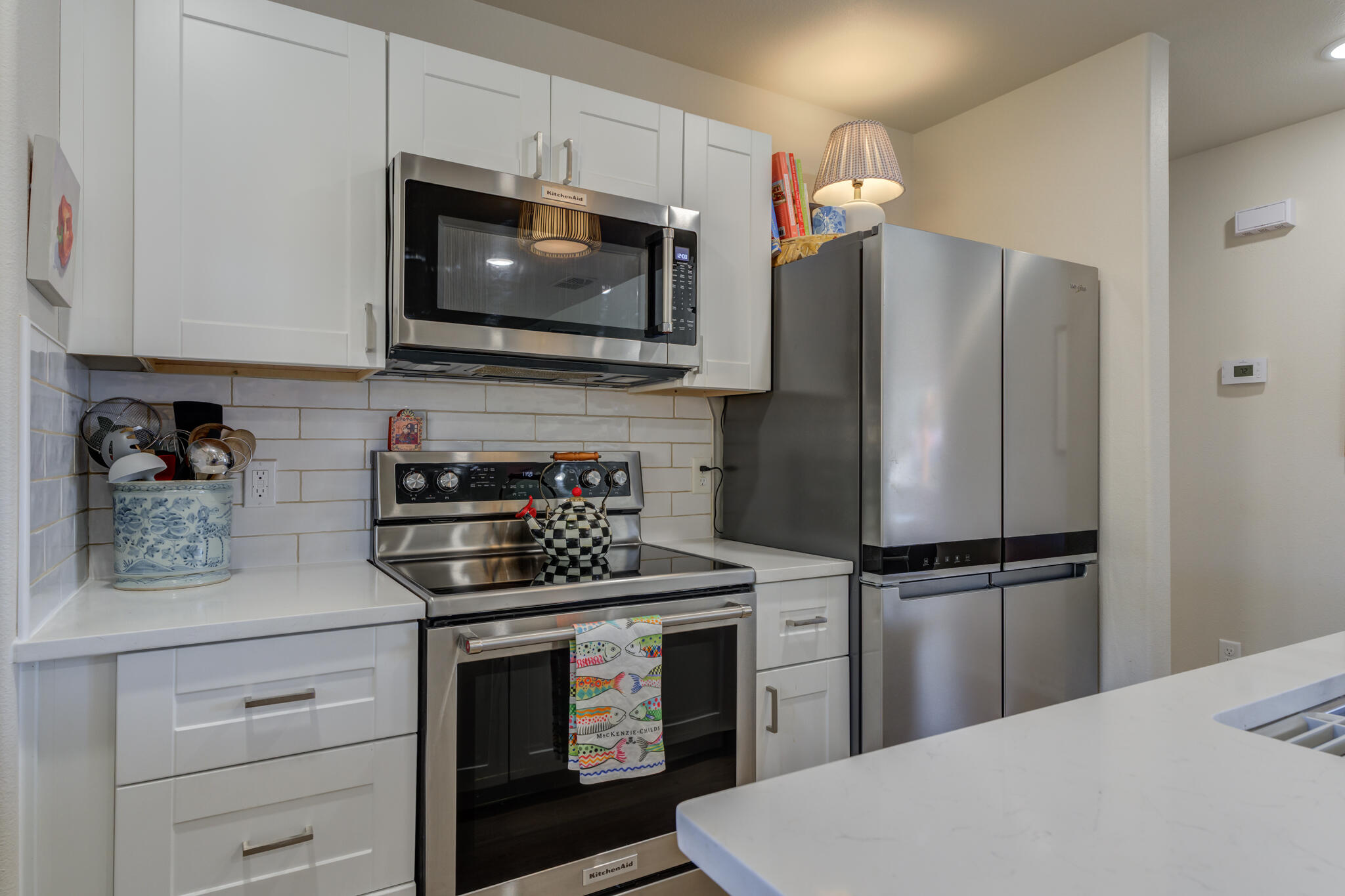 804 2nd Street Abernathy, TX 79311 - Photo 20 of 40 a kitchen with a refrigerator stove and microwave