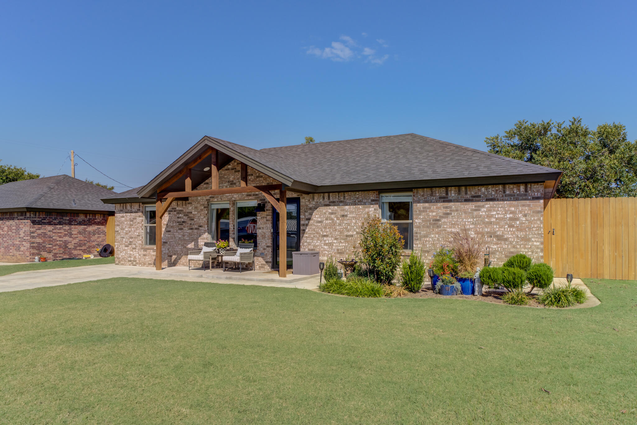 804 2nd Street Abernathy, TX 79311 - Photo 2 of 40 a front view of a house with garden