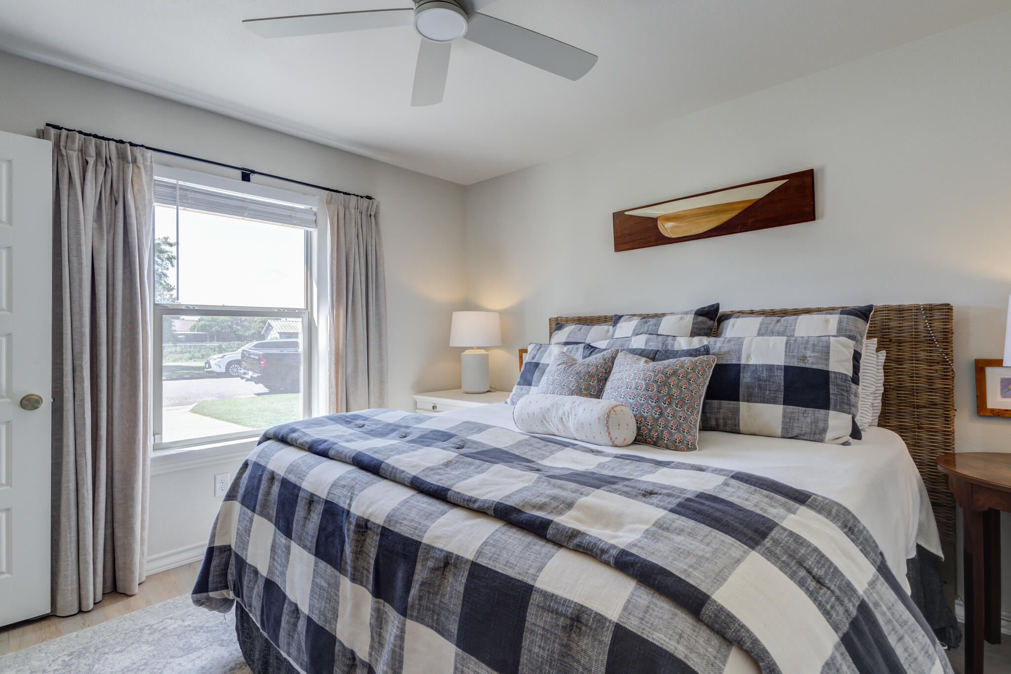 804 2nd Street Abernathy, TX 79311 - Photo 24 of 40 a bedroom with a large bed and a window