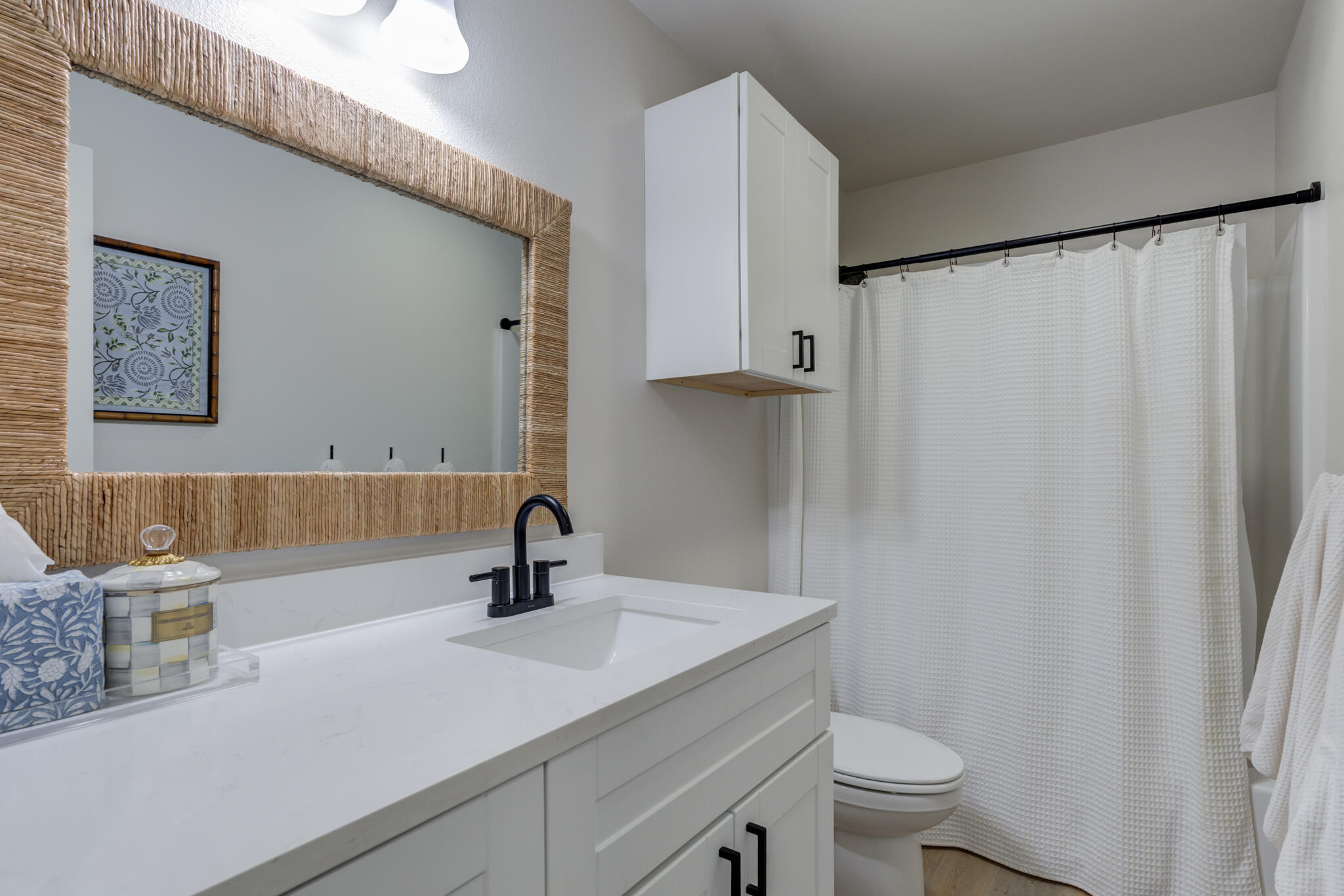 804 2nd Street Abernathy, TX 79311 - Photo 29 of 40 a bathroom with a sink a toilet and mirror