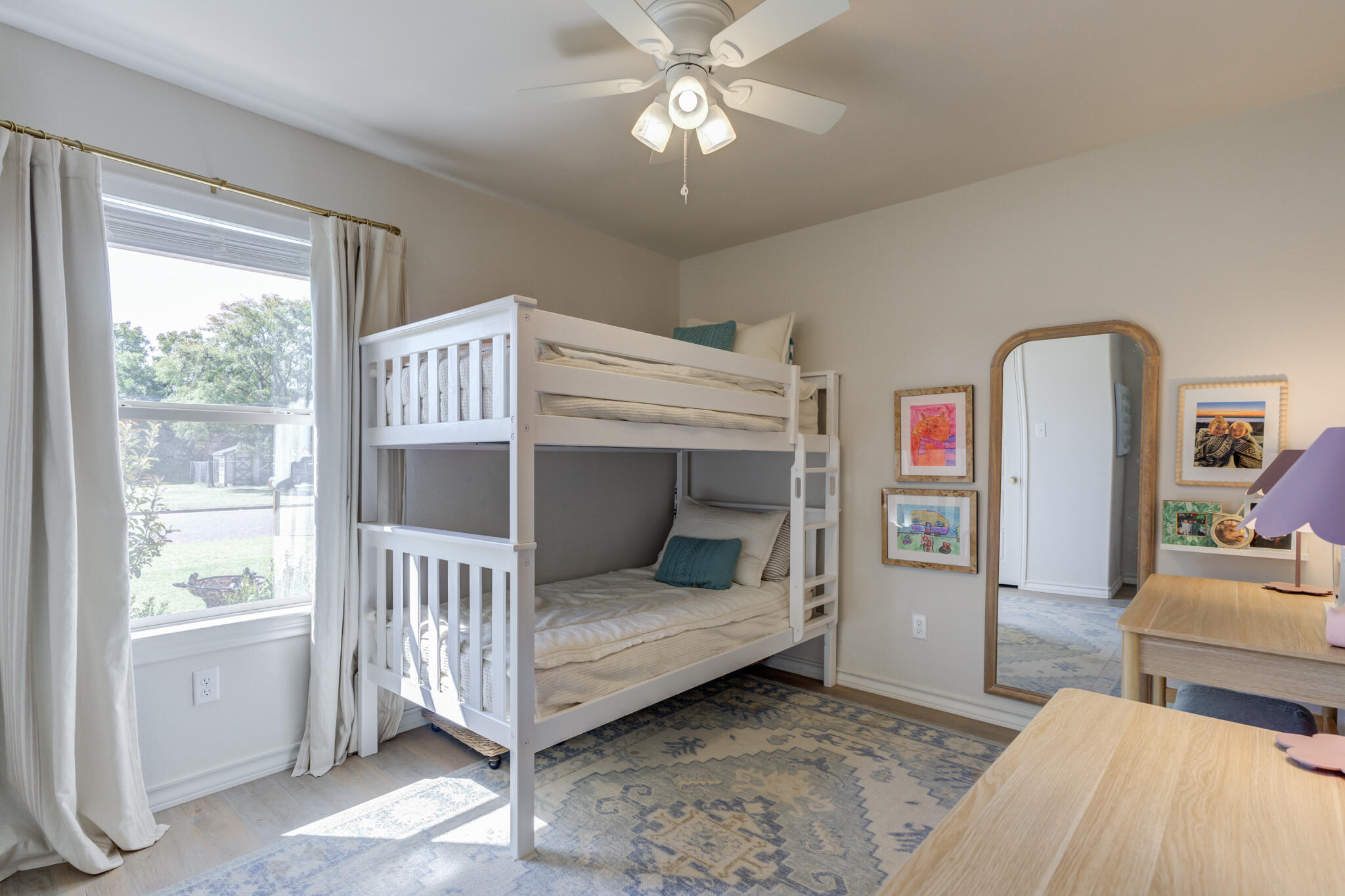 804 2nd Street Abernathy, TX 79311 - Photo 31 of 40 a bedroom with a bed and a window