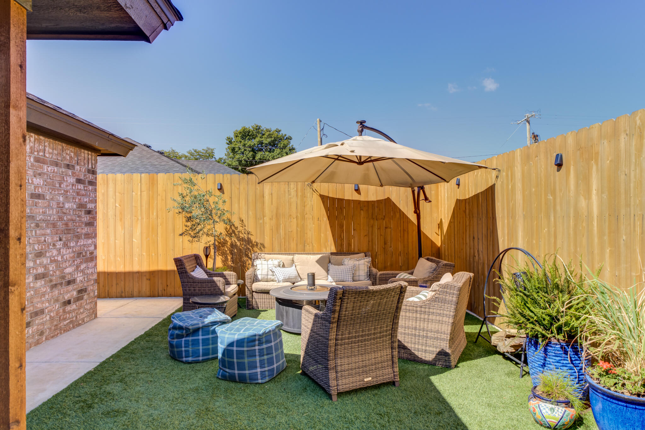 804 2nd Street Abernathy, TX 79311 - Photo 36 of 40 a living room with furniture and a yard