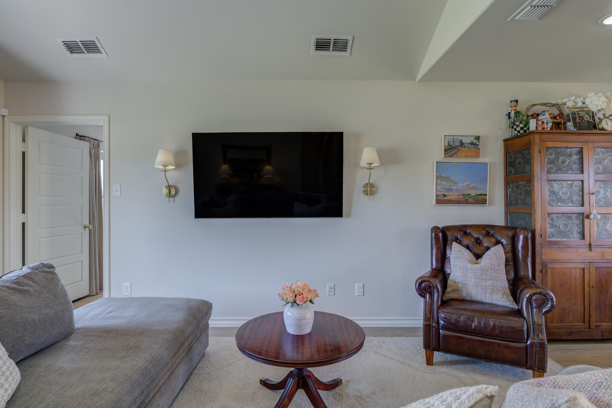 804 2nd Street Abernathy, TX 79311 - Photo 9 of 40 a living room with furniture and a flat screen tv