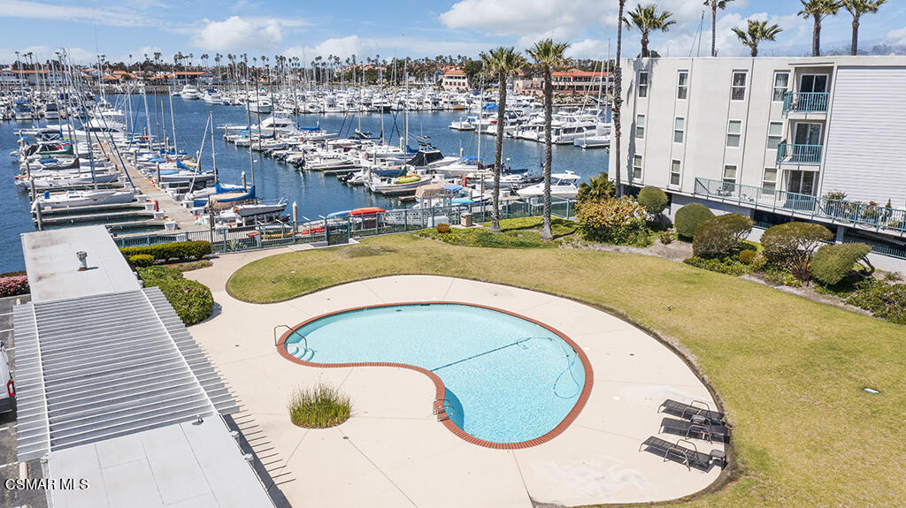 2901 Peninsula Road, Unit 137 Oxnard, CA 93035 - Photo 28 of 36 an aerial view of a swimming pool with outdoor seating
