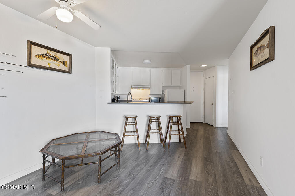 2901 Peninsula Road, Unit 137 Oxnard, CA 93035 - Photo 10 of 36 a view of kitchen with cabinets and wooden floor