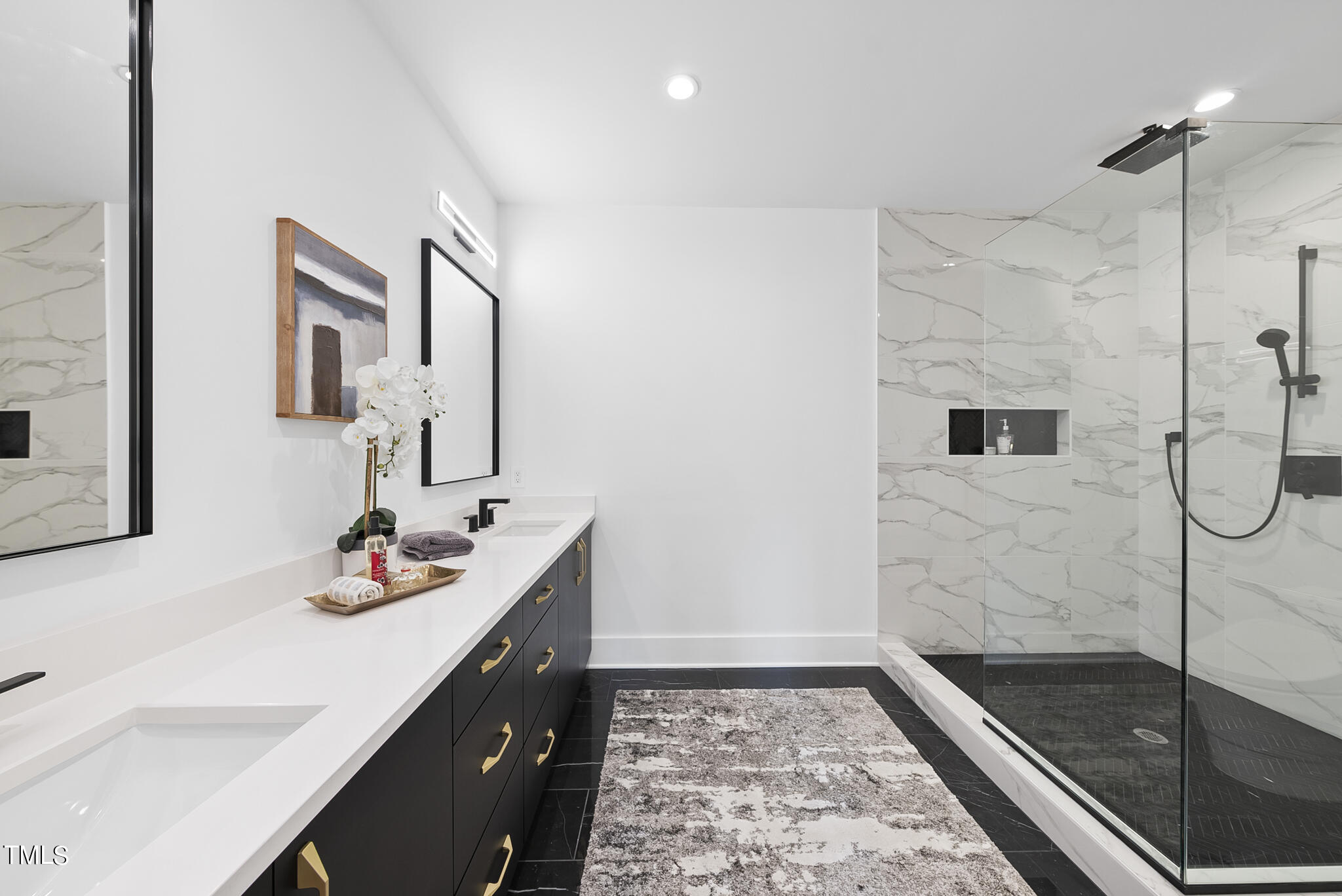 517 East Cabarrus Street Raleigh, NC 27601 - Photo 27 of 58 a bathroom with a sink and a mirror