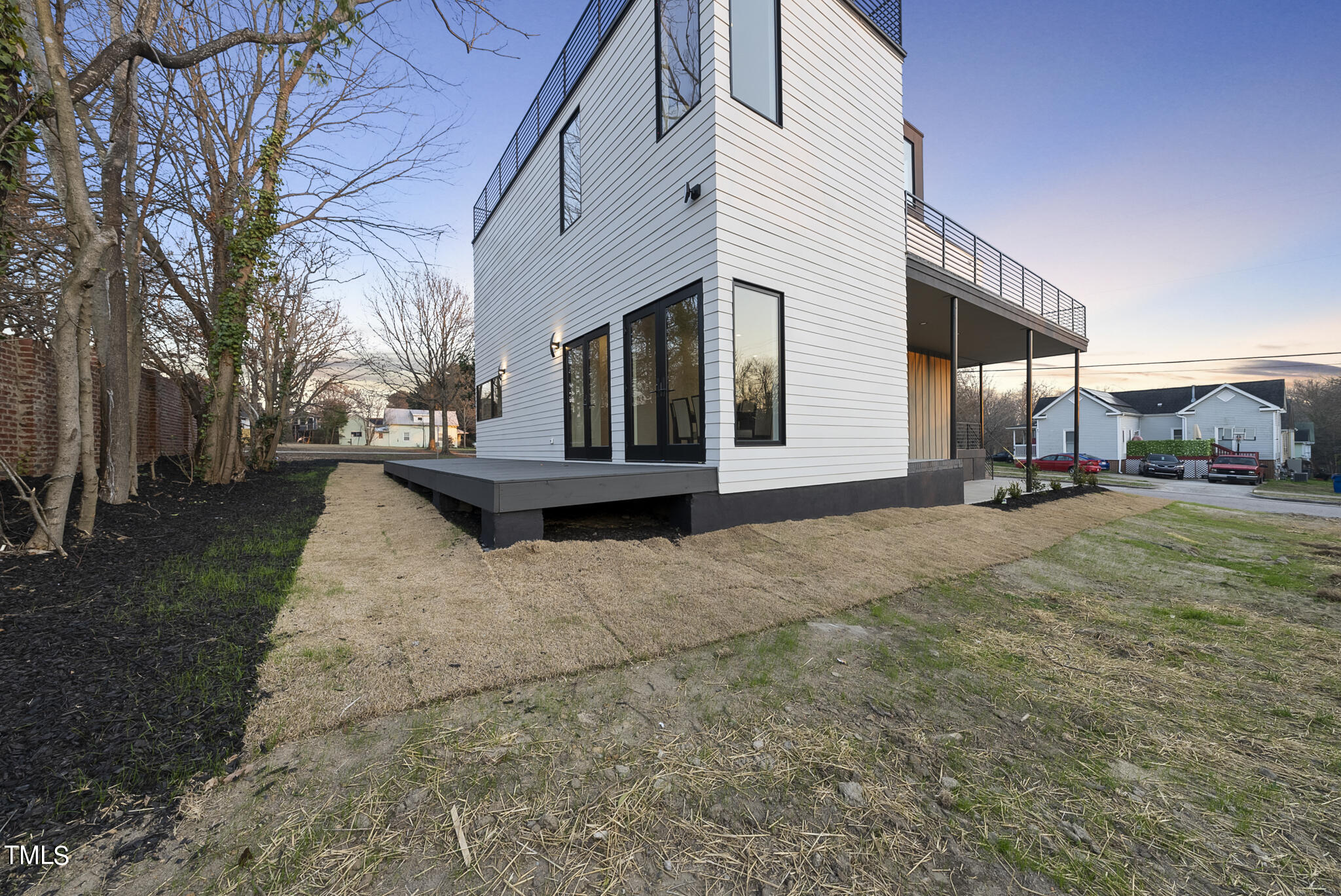517 East Cabarrus Street Raleigh, NC 27601 - Photo 55 of 58 a view of a house with a yard