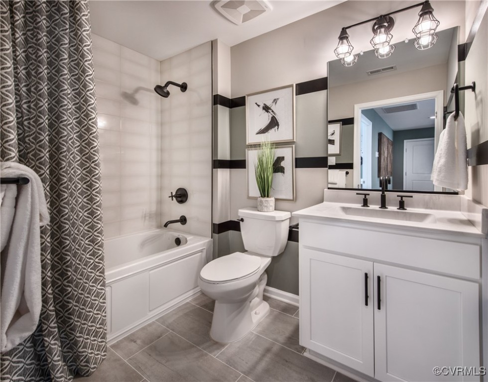 Undisclosed Address Chester, VA 23831 - Photo 24 of 41 Full bathroom with tiled shower / bath, vanity, an