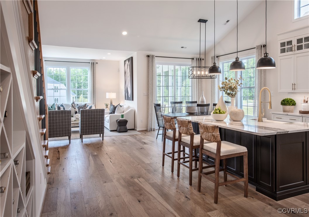 Undisclosed Address Chester, VA 23831 - Photo 5 of 41 Kitchen with sink, white cabinetry, light hardwood