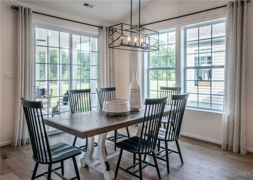 Undisclosed Address Chester, VA 23831 - Photo 10 of 41 Dining room with wood-type flooring and a notable