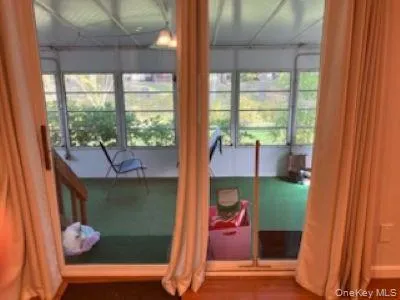 a room with furniture and a fireplace