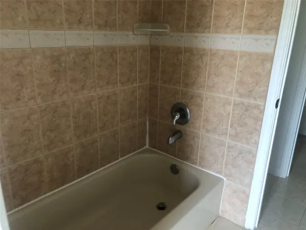 a bathroom with a bathtub