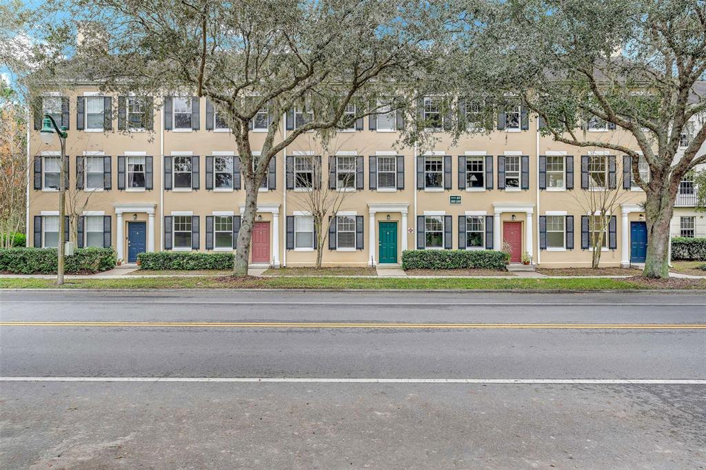 1008 Waterside Drive Celebration, FL 34747 - Photo 1 of 1 front view of residential houses with a street