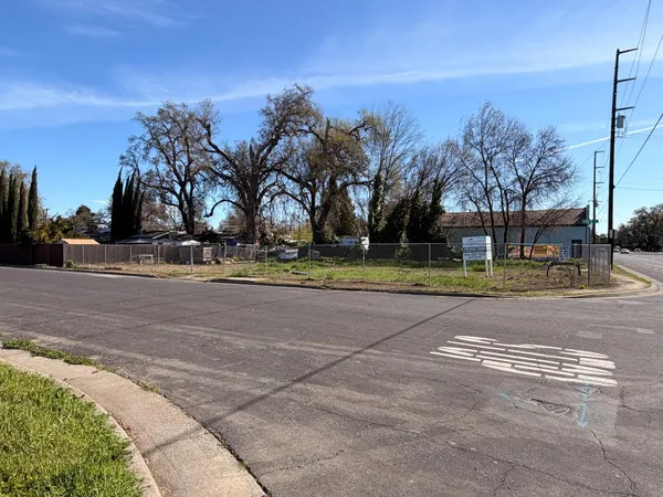 a view of street with houses