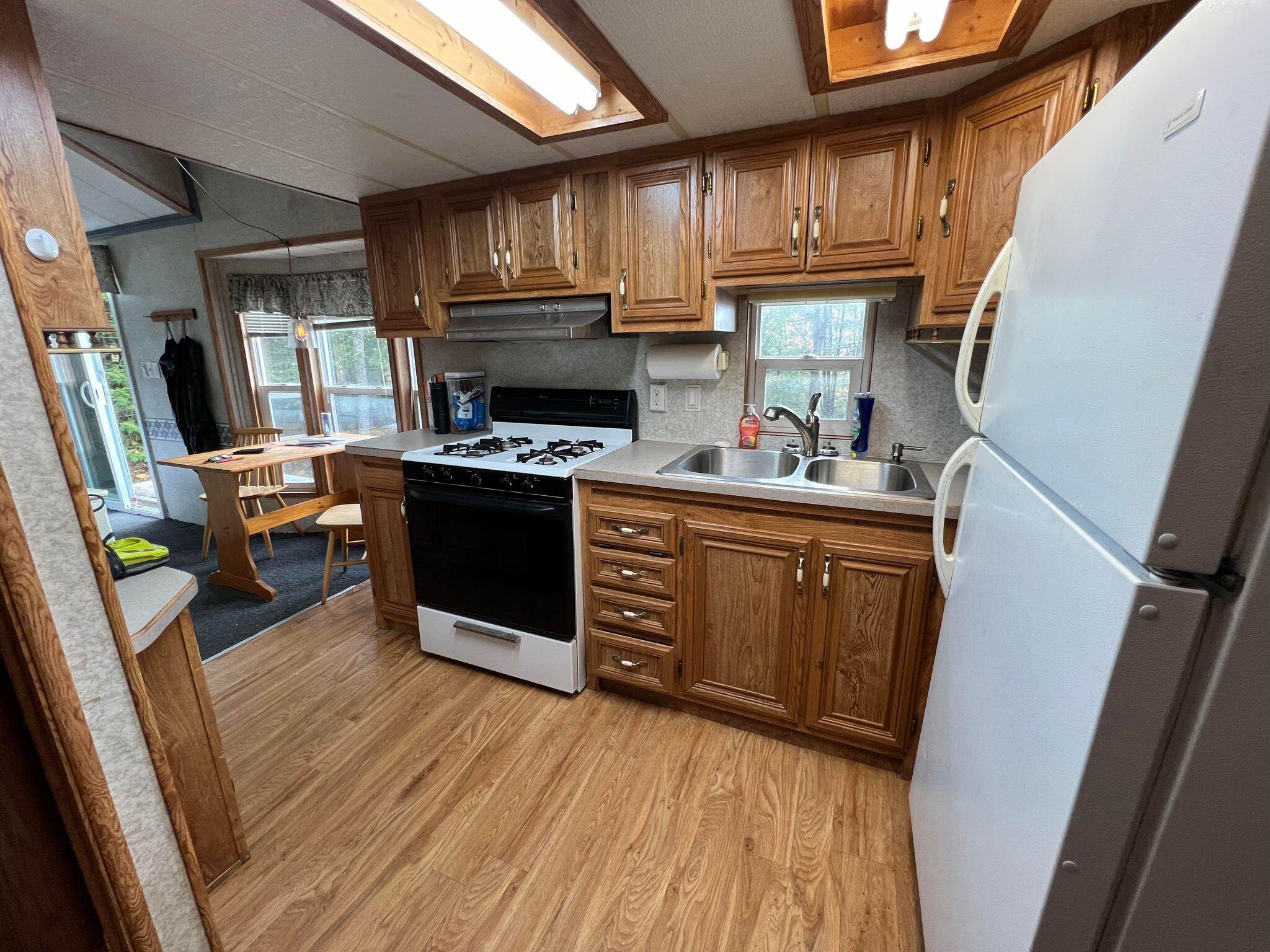 89 Thomas Pond Shore Road Casco, ME 04015 - Photo 4 of 18 393175618_328245049795608_62819298666201