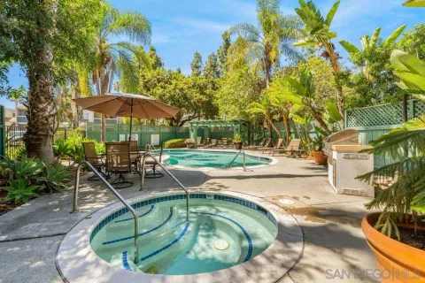 a view of a swimming pool with a patio