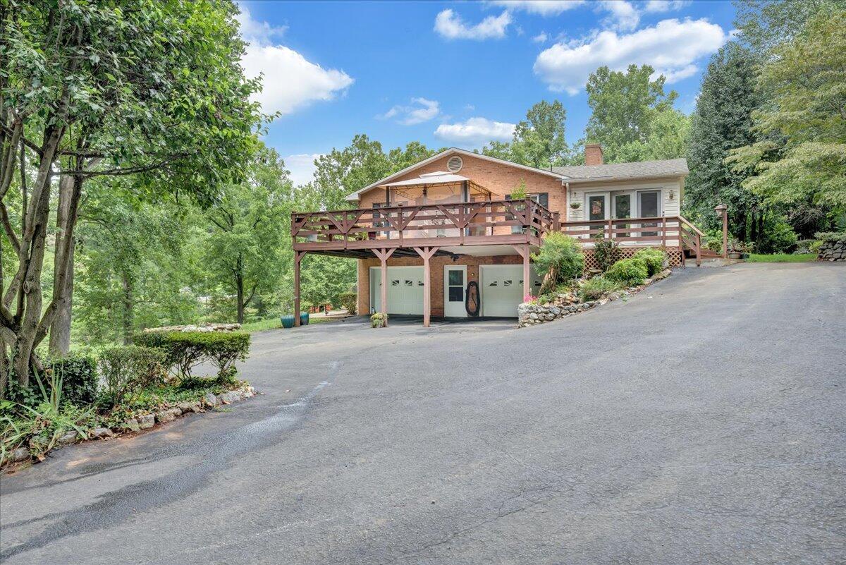 13690 Stewartsville Road Goodview, VA 24095 - Photo 54 of 69 a view of a house with a garden