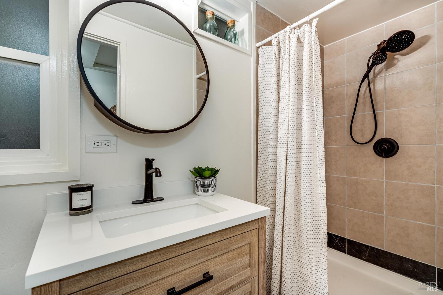 15300 Canyon 3 Road Guerneville, CA 95446 - Photo 14 of 37 a bathroom with a sink a toilet and a mirror