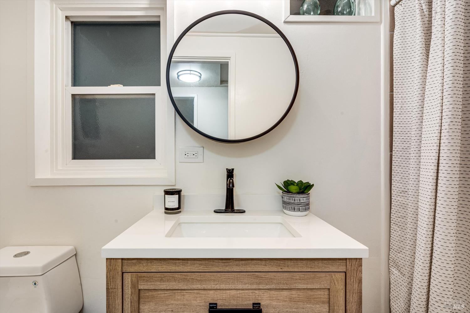 15300 Canyon 3 Road Guerneville, CA 95446 - Photo 15 of 37 a bathroom with a sink and a mirror