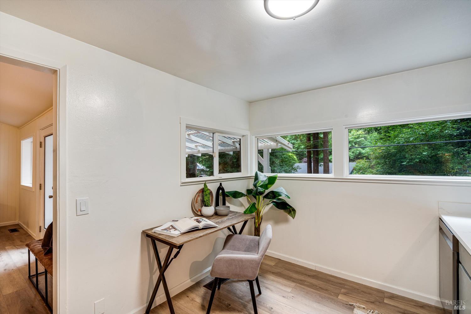 15300 Canyon 3 Road Guerneville, CA 95446 - Photo 20 of 37 a view of a workspace with furniture and a window