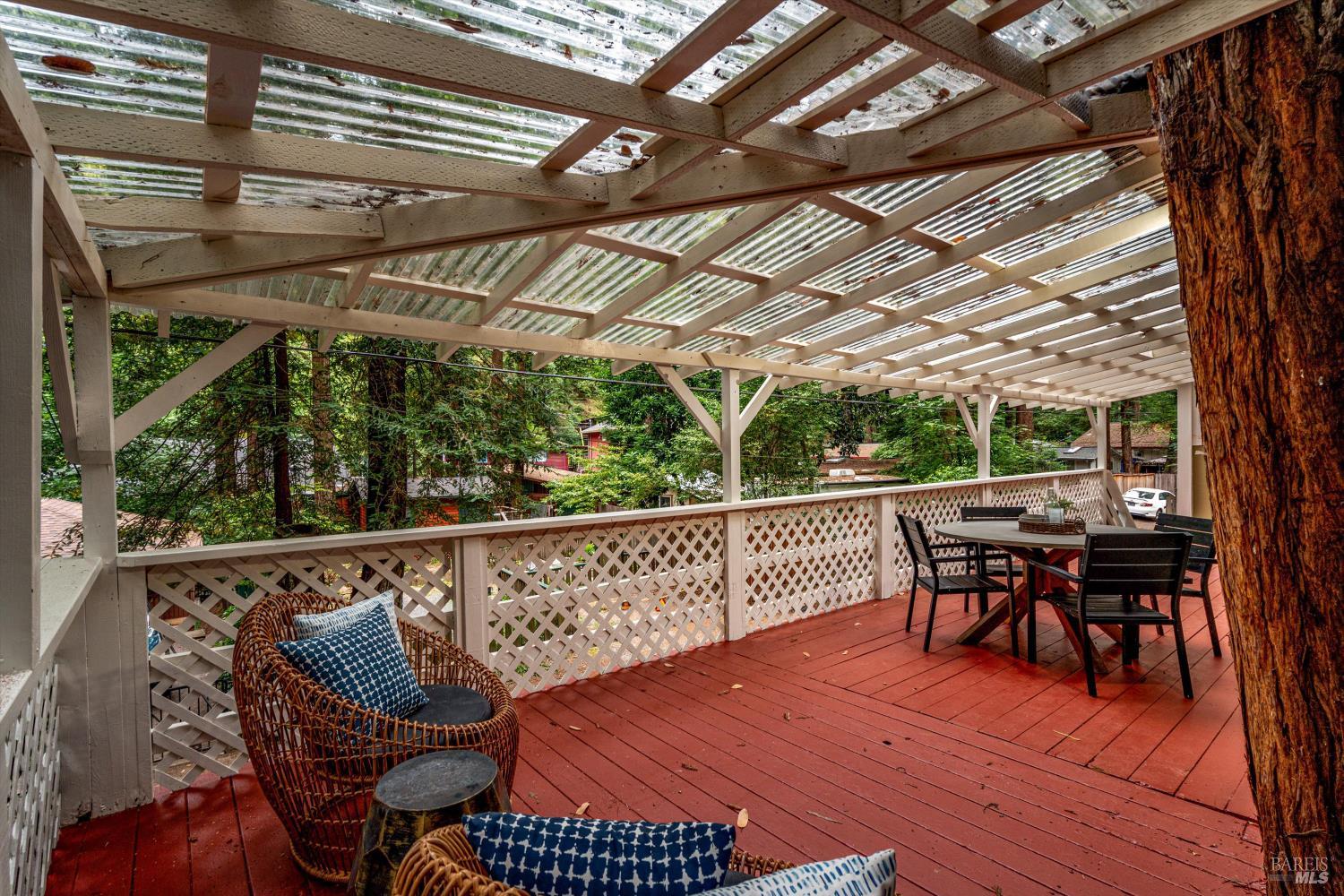 15300 Canyon 3 Road Guerneville, CA 95446 - Photo 27 of 37 a view of a chairs and table in the patio