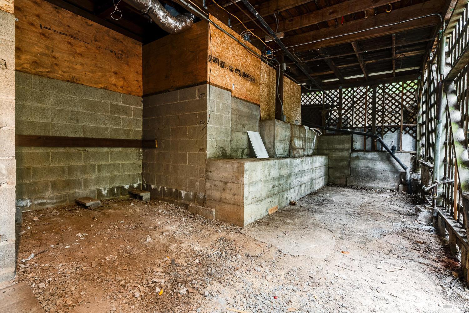 15300 Canyon 3 Road Guerneville, CA 95446 - Photo 33 of 37 a view of a room with wooden walls