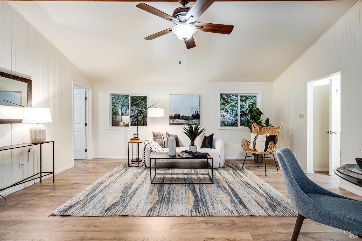15300 Canyon 3 Road Guerneville, CA 95446 - Photo 5 of 37 a living room with furniture and a wooden floor