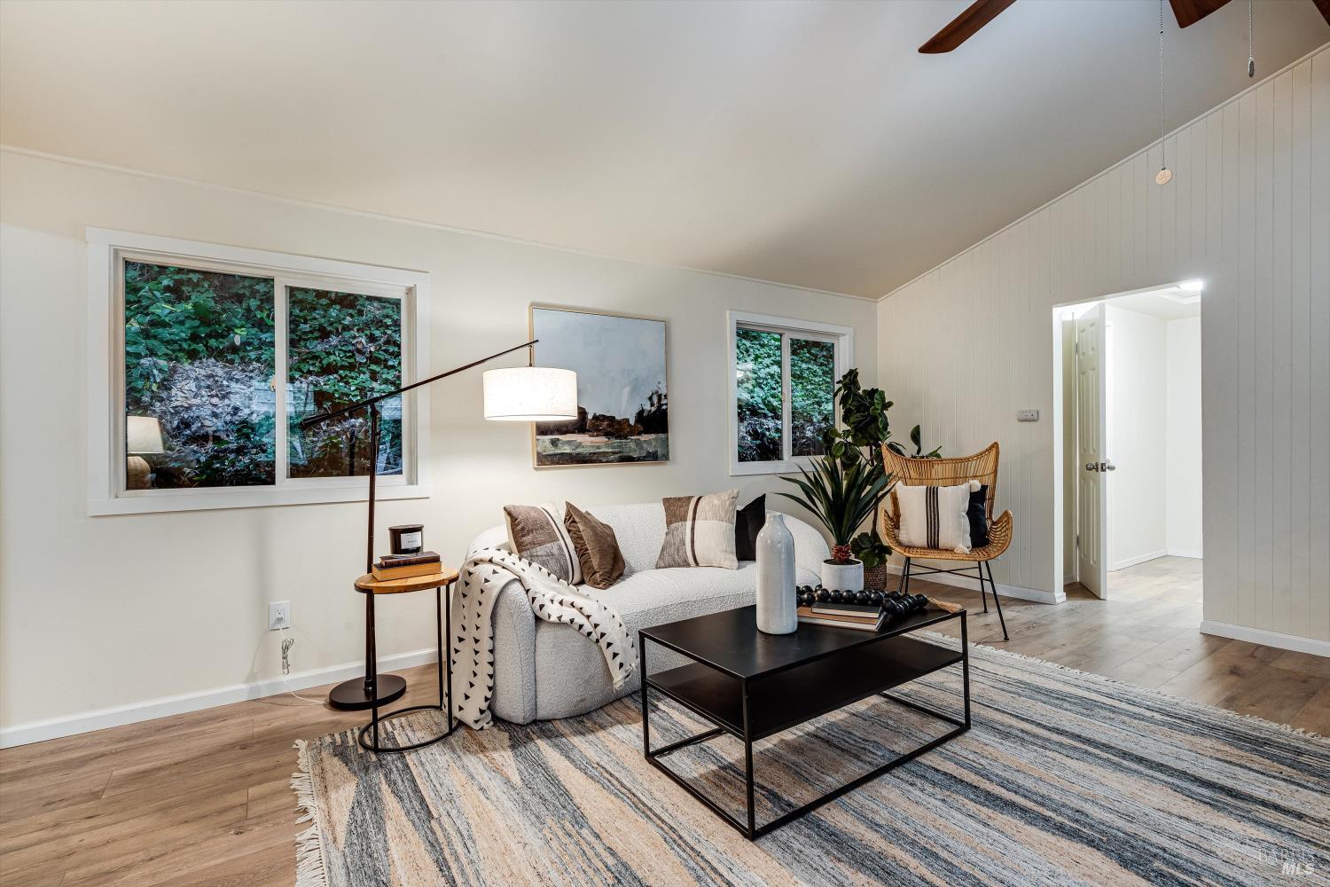15300 Canyon 3 Road Guerneville, CA 95446 - Photo 8 of 37 a living room with furniture and a wooden floor