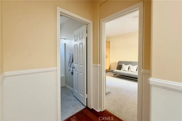 a view of a bedroom from a hallway