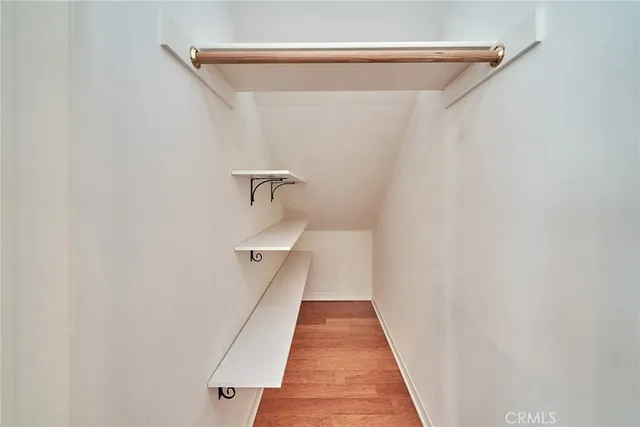 a view of a hallway with a glass door