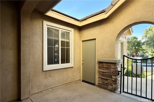 a front view of a house with a porch