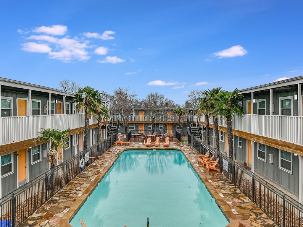 a view of a house with a swimming pool