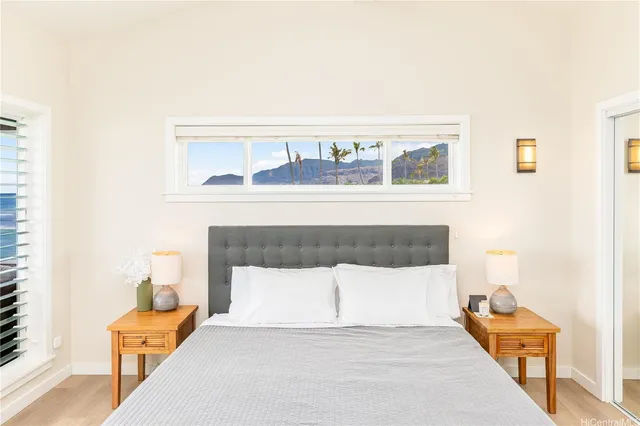 a living room with a couch and white walls