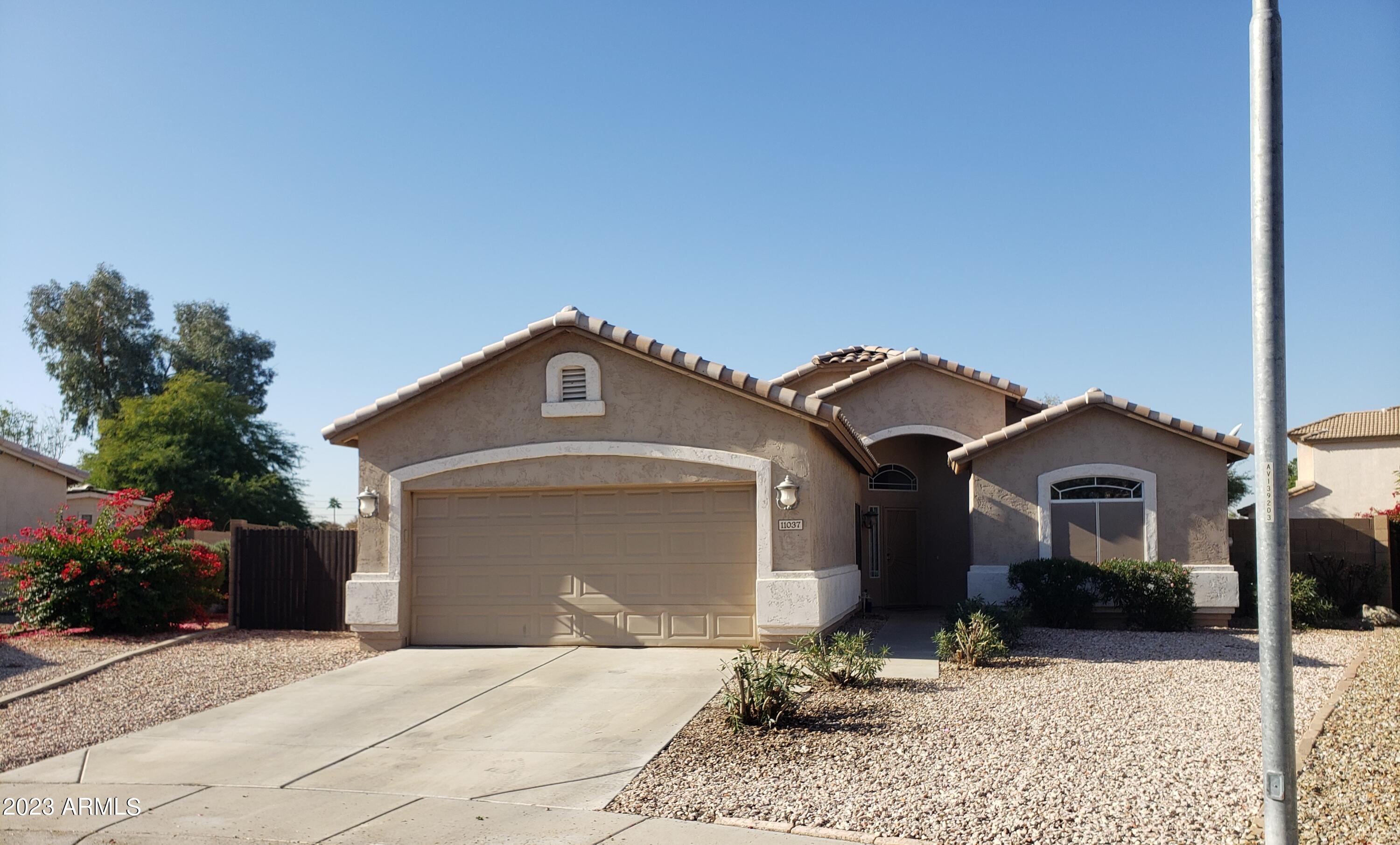 11037 West Granada Road Avondale, AZ 85392 - Photo 1 of 15 front of home