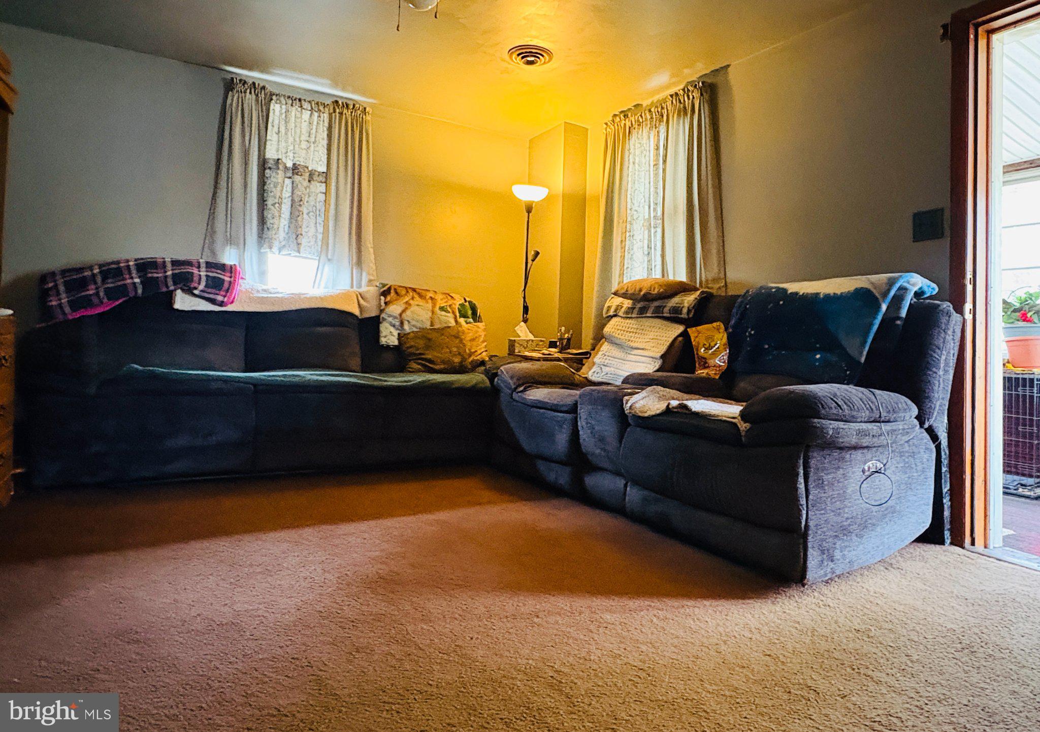 1621 Rosewick Avenue Rosedale, MD 21237 - Photo 11 of 37 Cozy corner with warm lighting.