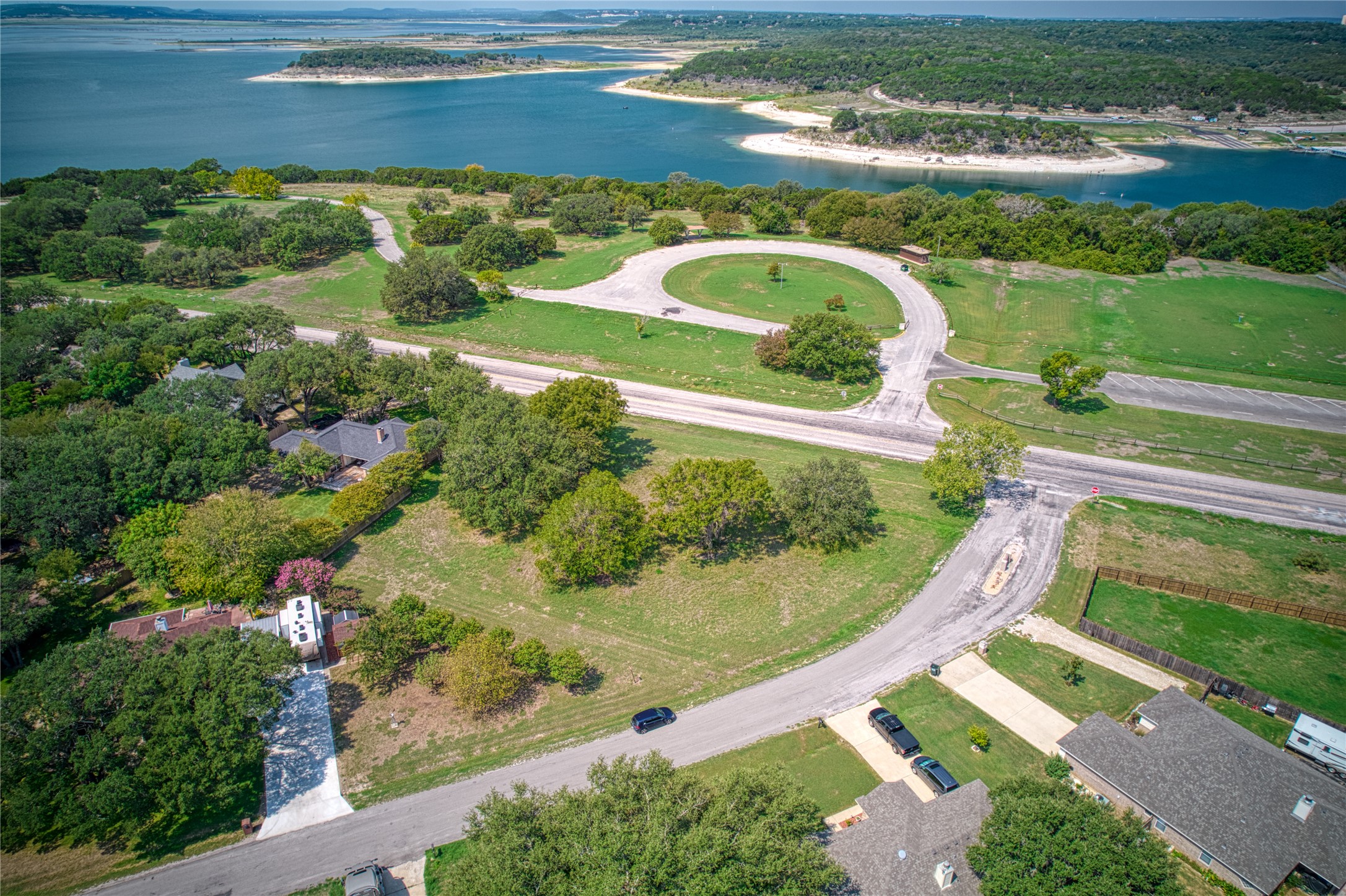 1670 Fm 1670 Whisper Trail Road Belton, TX 76513 - Photo 5 of 17 a view of a lake with a yard