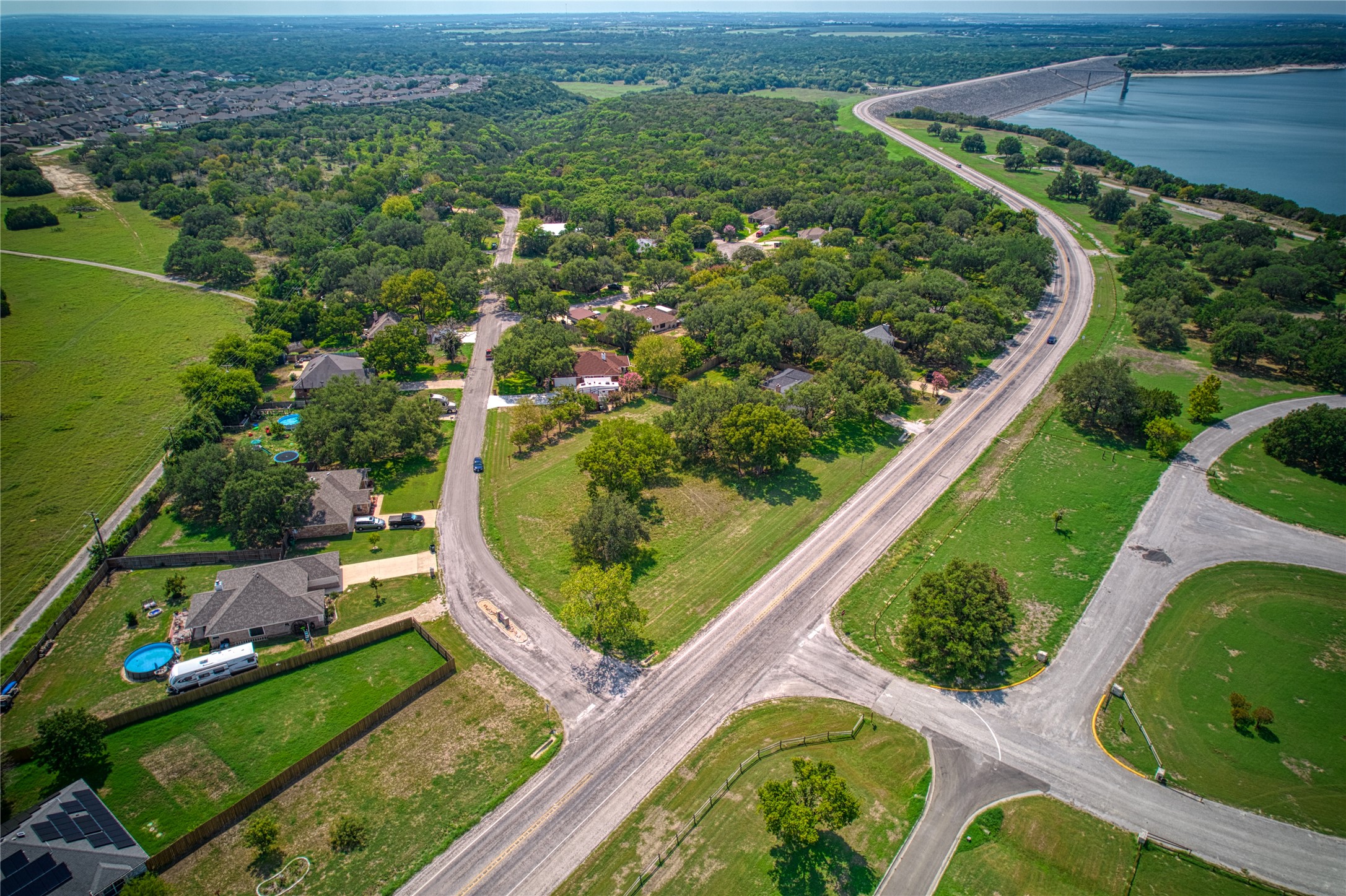 1670 Fm 1670 Whisper Trail Road Belton, TX 76513 - Photo 9 of 17 an aerial view of a golf course with a lake view