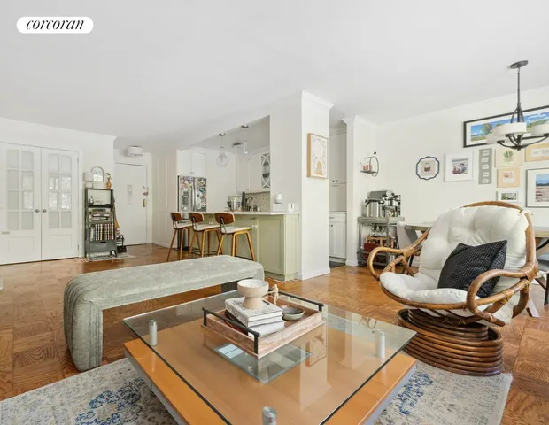 a large white kitchen with a large window