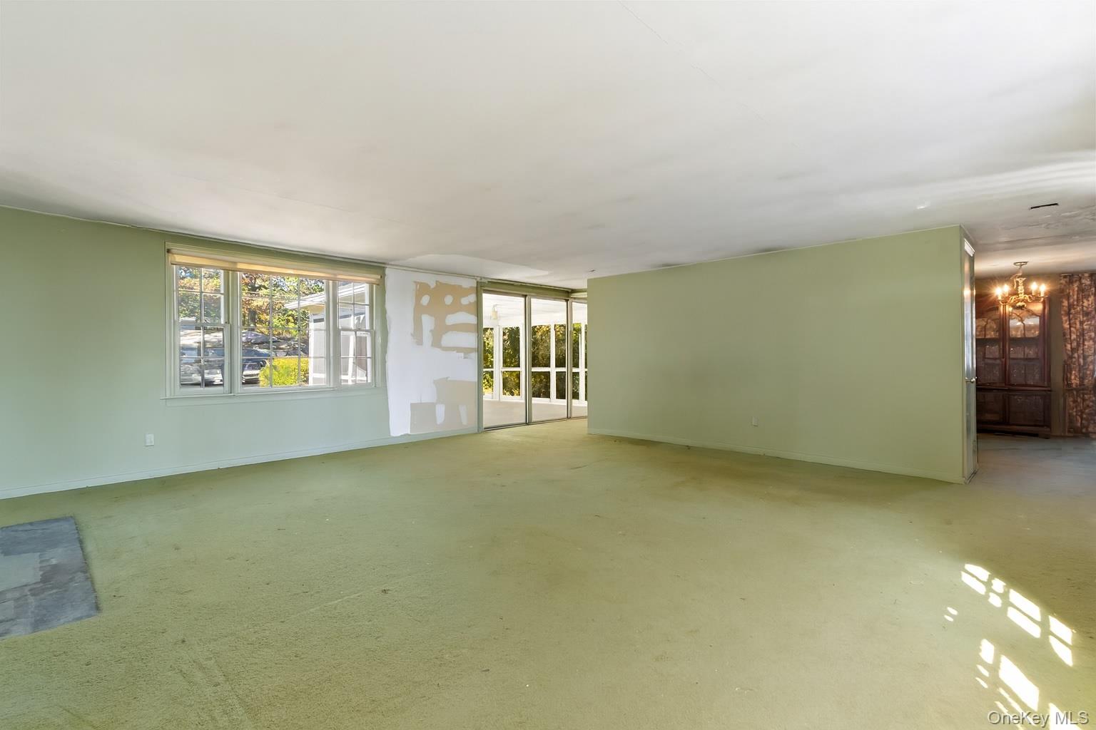 87 Rockledge Road Bronxville, NY 10708 - Photo 3 of 14 an empty room with windows