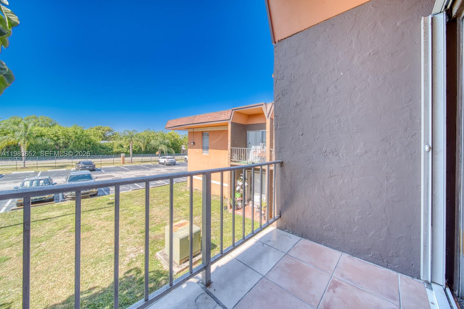 9459 Southwest 76th Street, Unit R5 Miami, FL 33173 - Photo 21 of 33 a view of balcony with furniture