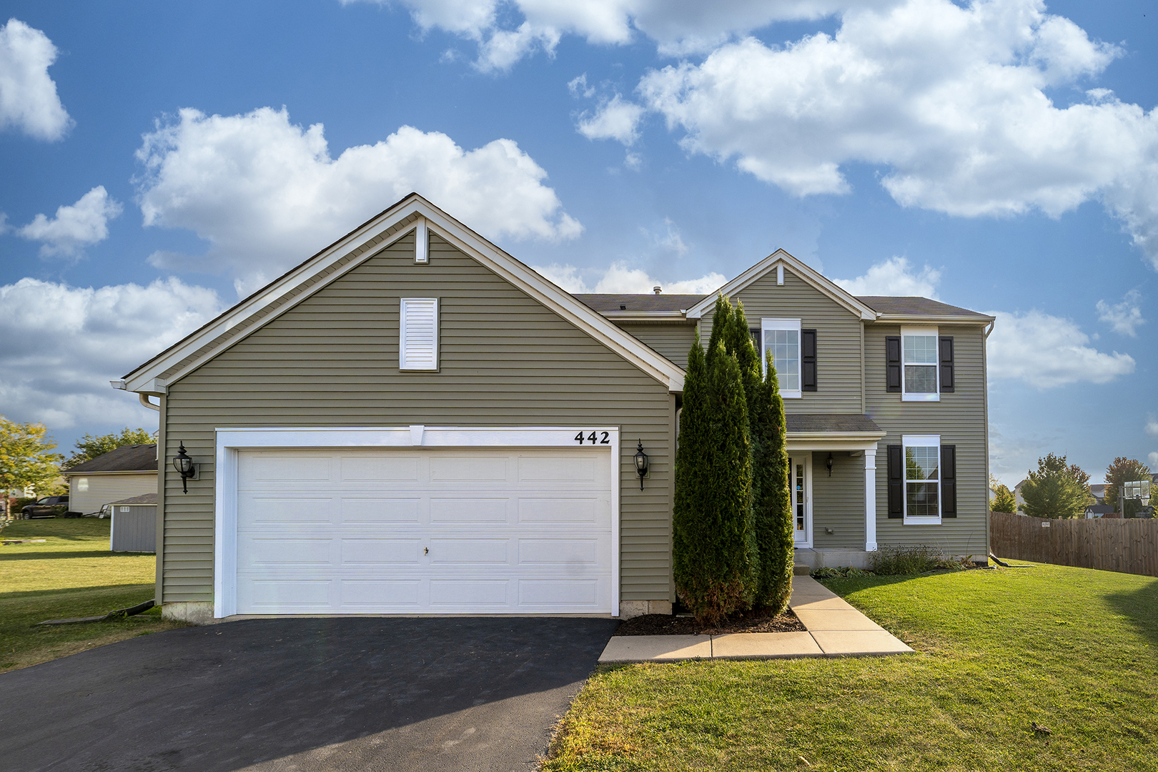 442 Windett Ridge Road Yorkville, IL 60560 - Photo 1 of 26 a view of backyard of house with wooden floor and fence