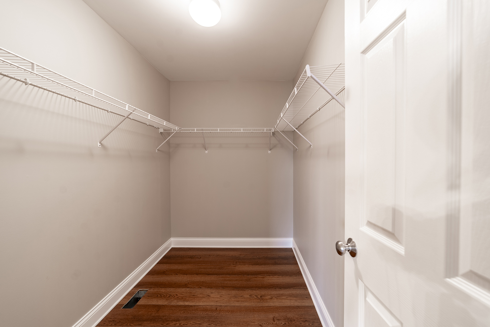 442 Windett Ridge Road Yorkville, IL 60560 - Photo 16 of 26 a view of a room with racks on the wall