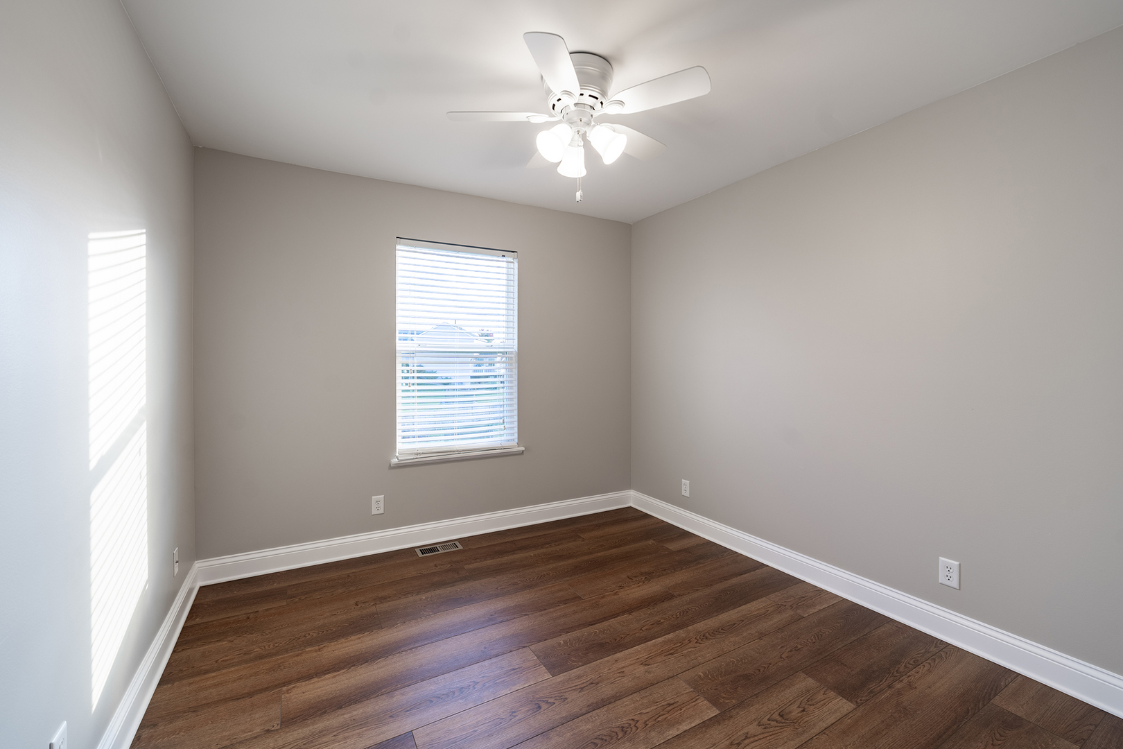 442 Windett Ridge Road Yorkville, IL 60560 - Photo 21 of 26 wooden floor in an empty room with a window