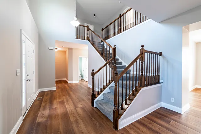 a view of entryway with wooden floor
