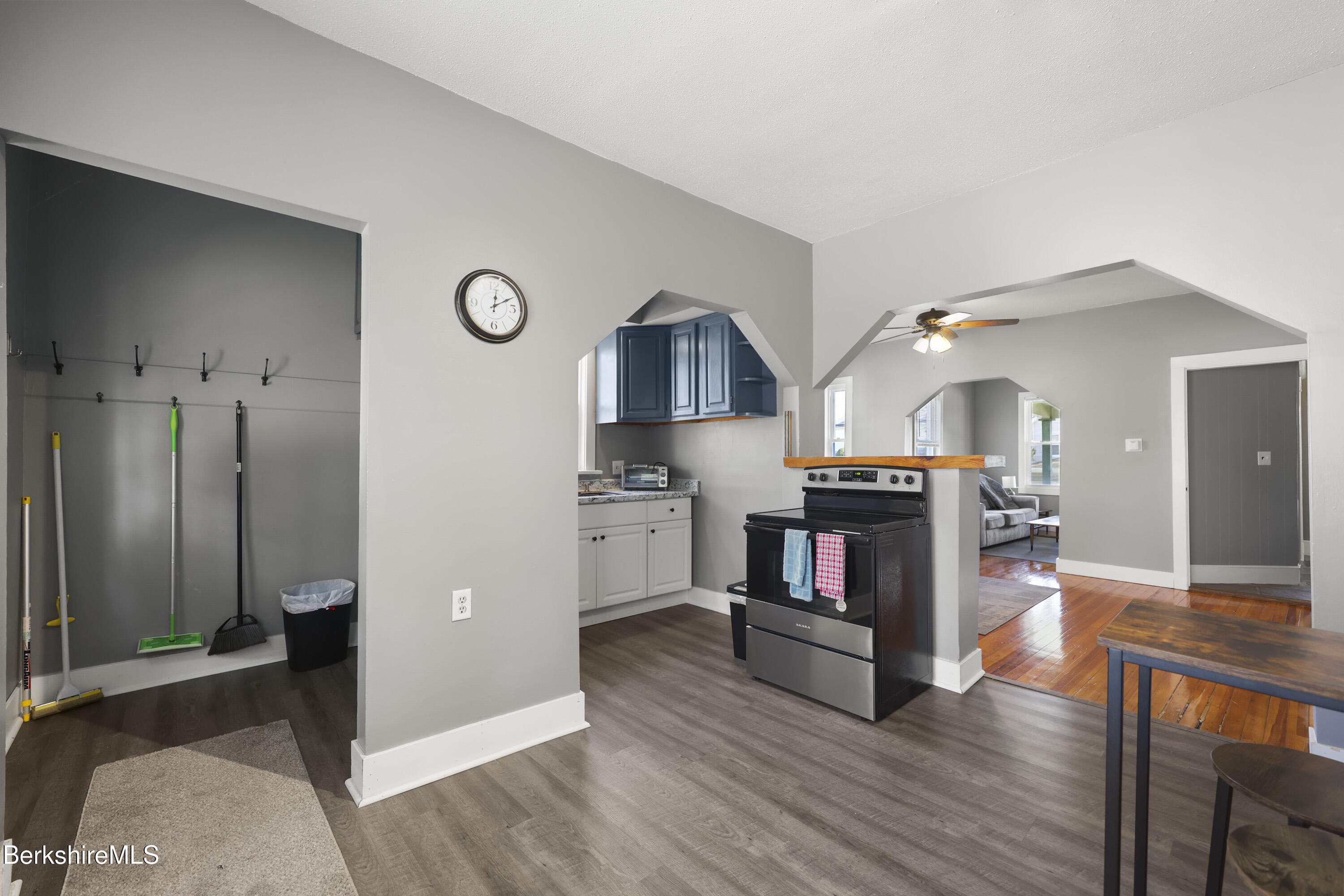 105-107 Onota Street Pittsfield, MA 01201 - Photo 13 of 46 a living room with furniture and a wooden floor
