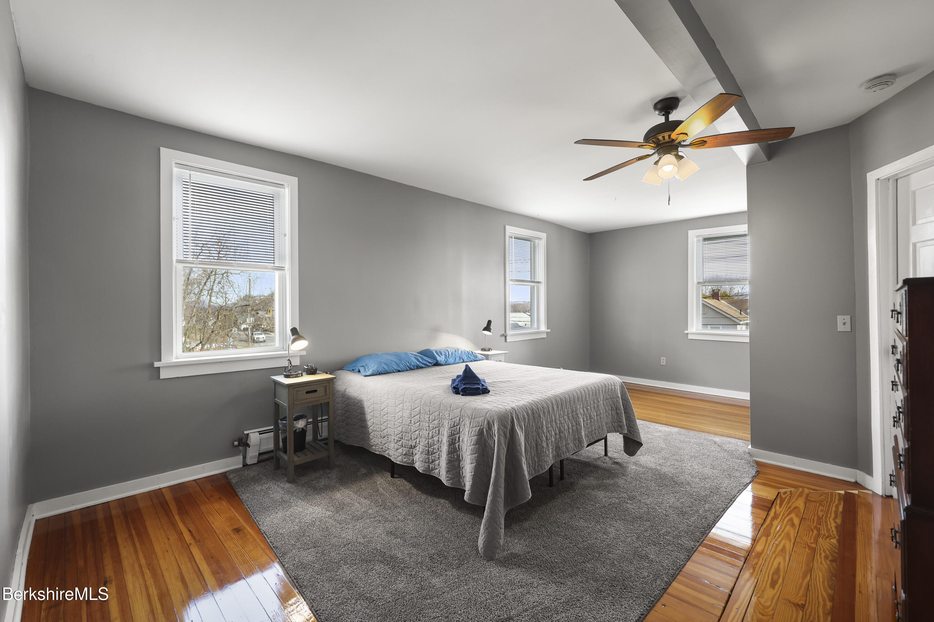 105-107 Onota Street Pittsfield, MA 01201 - Photo 17 of 46 a bedroom with a bed and window