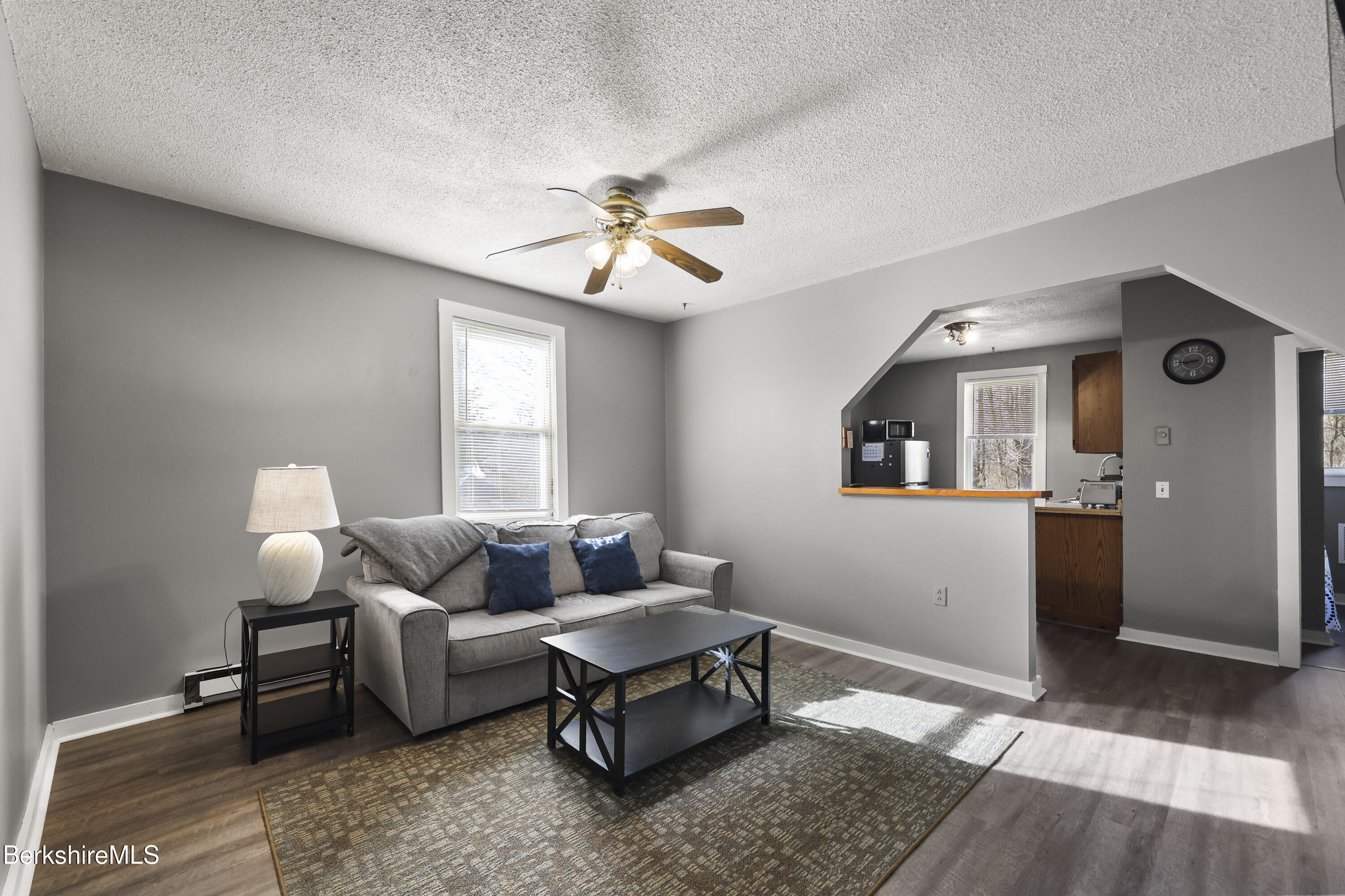 105-107 Onota Street Pittsfield, MA 01201 - Photo 26 of 46 a living room with furniture and a window