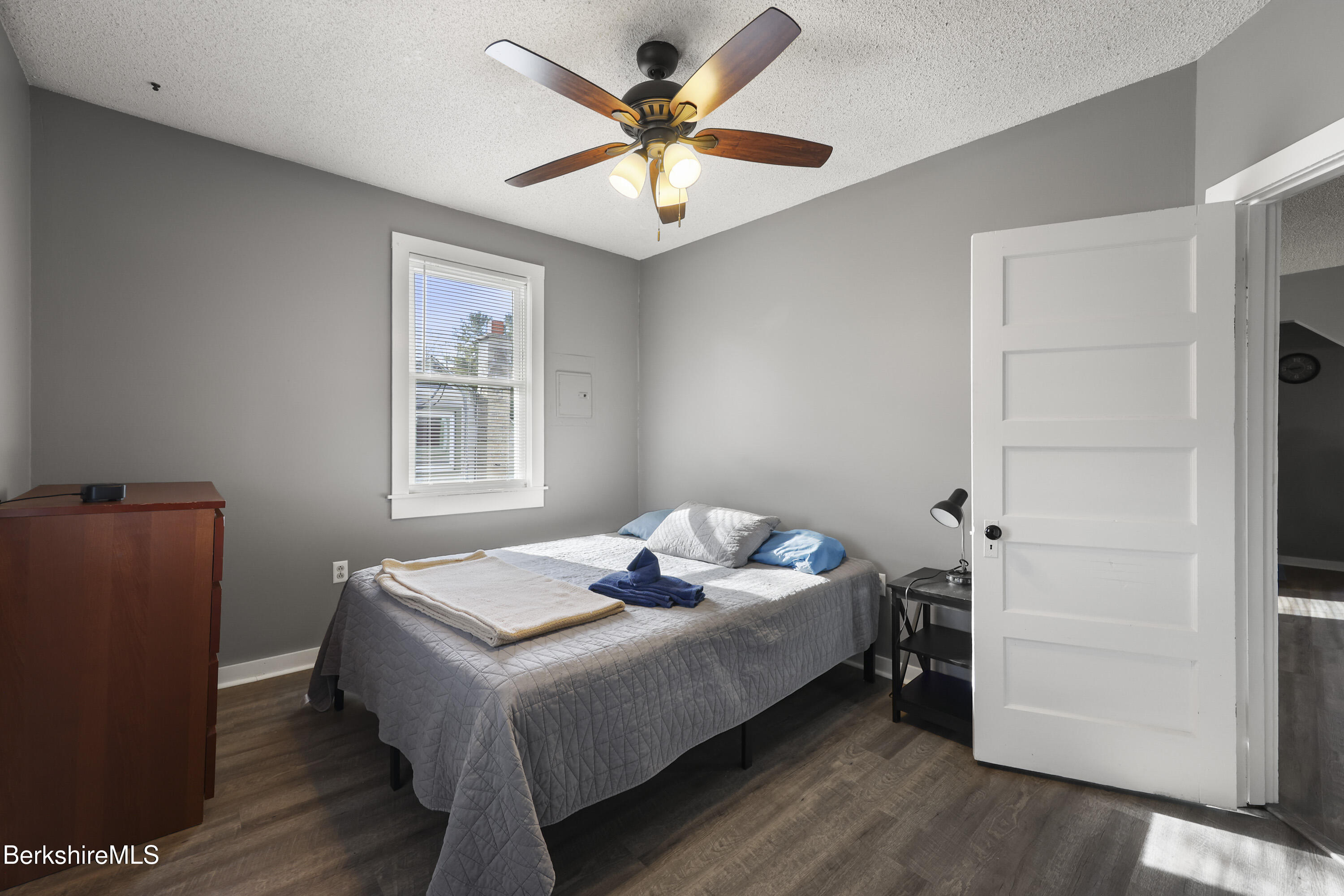 105-107 Onota Street Pittsfield, MA 01201 - Photo 35 of 46 a bedroom with a bed and a window