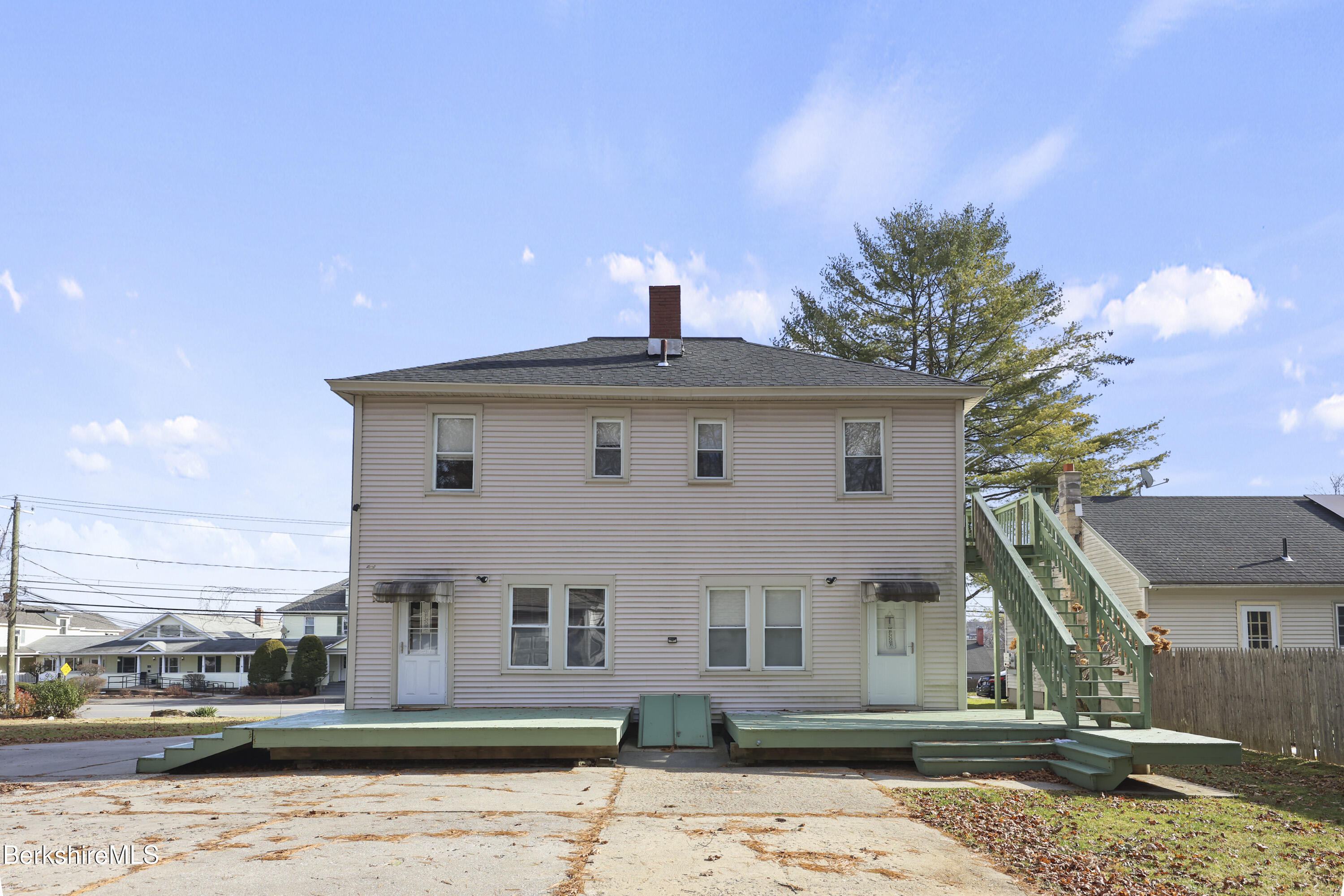105-107 Onota Street Pittsfield, MA 01201 - Photo 38 of 46 a front view of a house with a yard