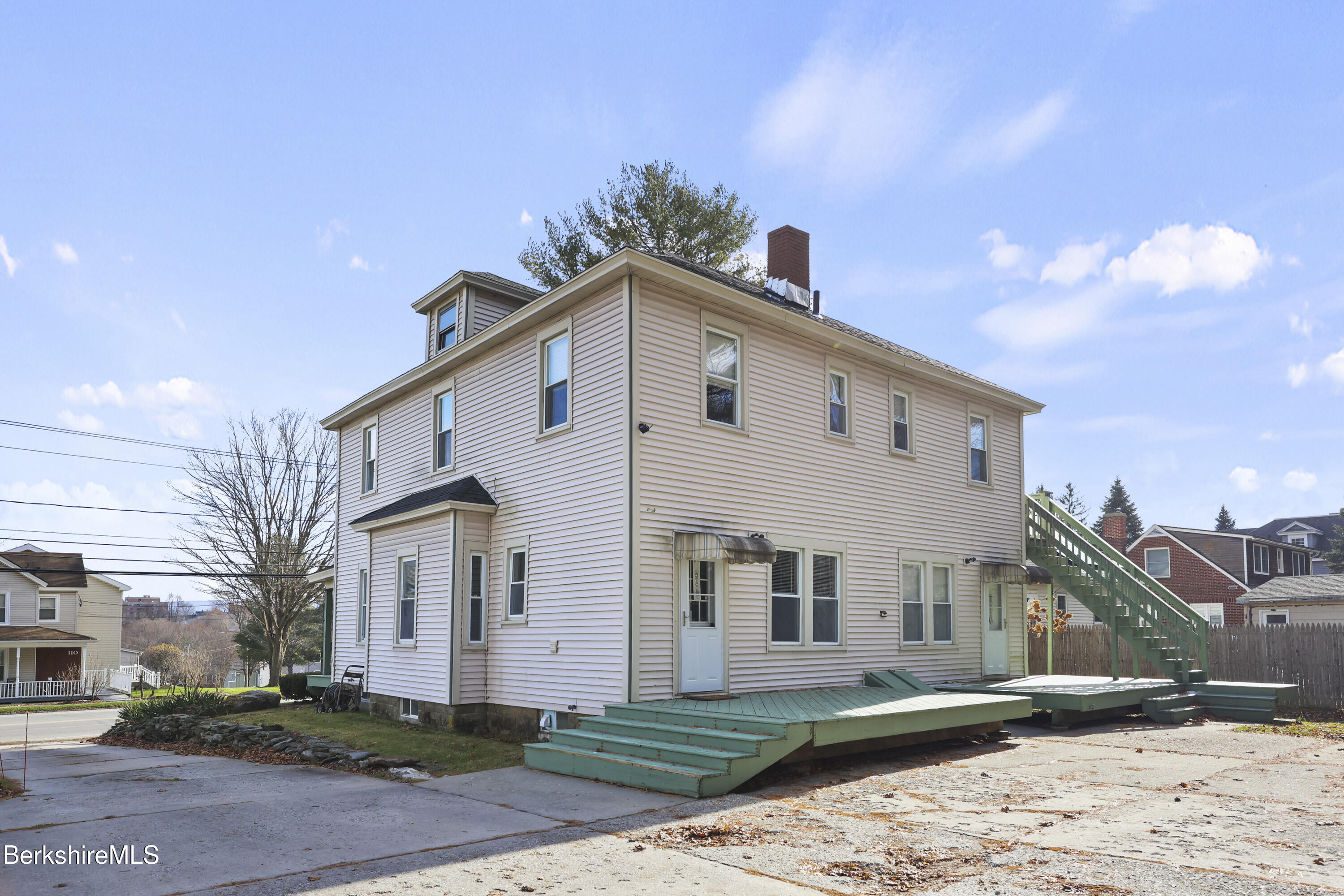 105-107 Onota Street Pittsfield, MA 01201 - Photo 39 of 46 a front view of a house with a yard